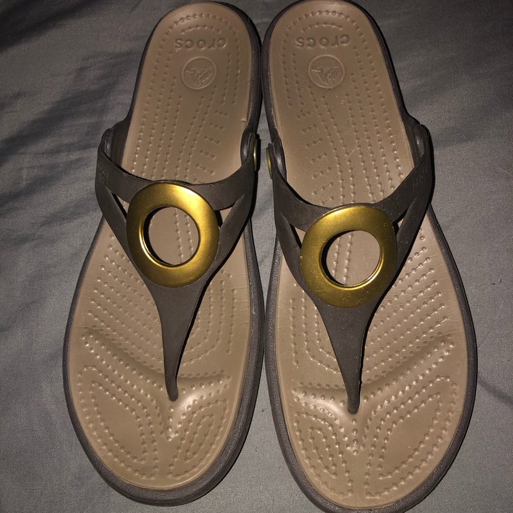 CROCS flip flops. Size 9. Brown/Tan